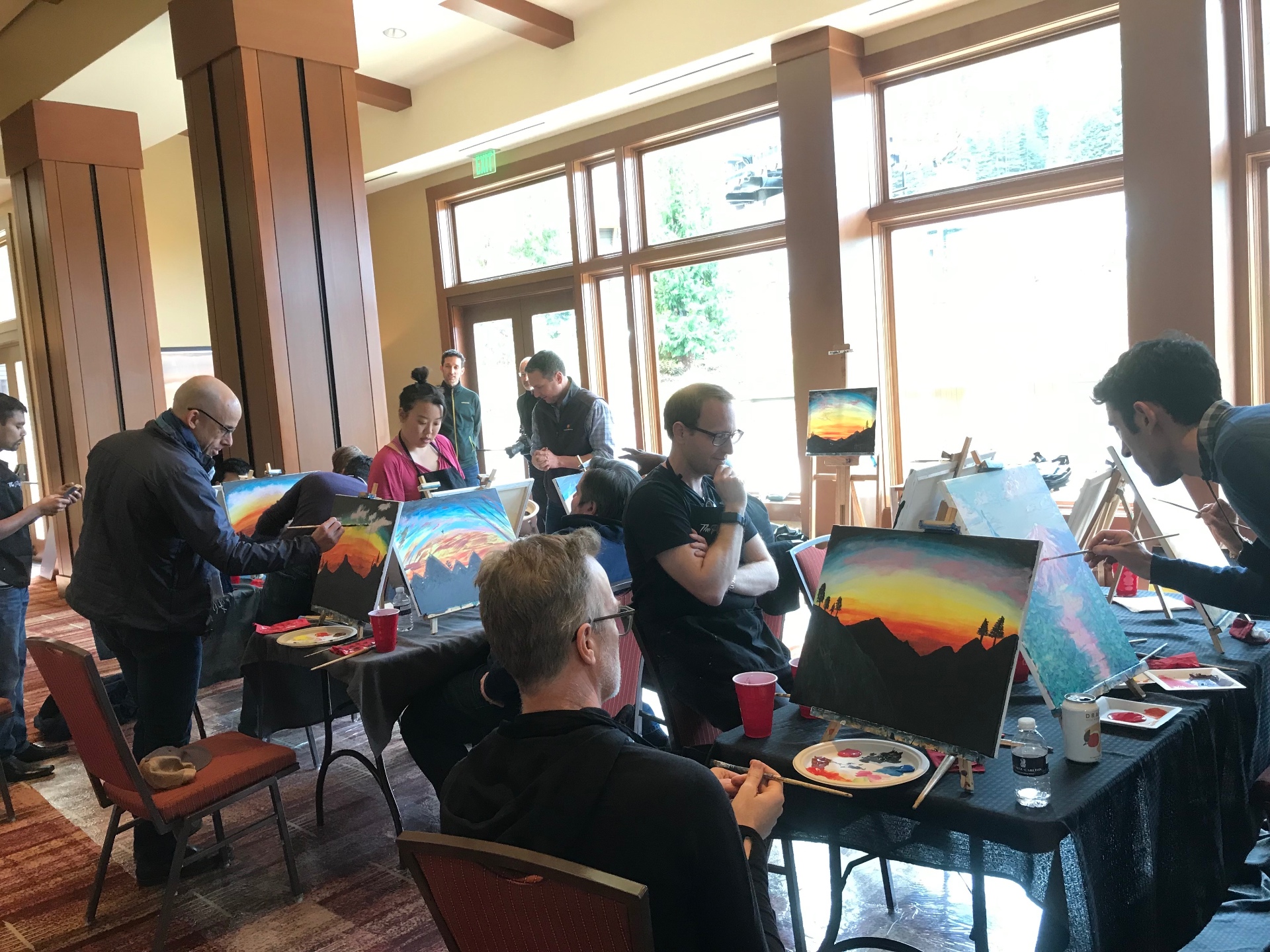 Corporate team painting together at a Tahoe offsite
